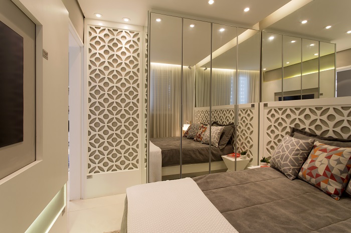 Foto do quarto de casal do apartamento decorado do HomeClub Carrão| Tibério Construtora